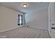 Bedroom with neutral walls and carpet flooring, bathed in natural light at 45322 W Sandhill Rd, Maricopa, AZ 85139