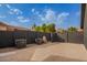 Low maintenance backyard with an updated fence and patio area at 5726 E Woodridge Dr, Scottsdale, AZ 85254