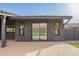 The backyard of the home showing the patio, slider window, and landscaped gravel at 5726 E Woodridge Dr, Scottsdale, AZ 85254