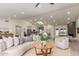 Bright living room showcasing an open floorplan, recessed lighting, and vaulted ceilings at 5726 E Woodridge Dr, Scottsdale, AZ 85254