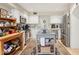 Bright kitchen featuring white cabinetry, stainless steel appliances, an island, and mosaic backsplash at 5825 N 12Th St # 3, Phoenix, AZ 85014