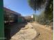 Backyard featuring a firepit, patio, and landscaping elements at 6528 N Hillside Dr, Paradise Valley, AZ 85253