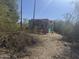 Backyard showing native trees and abandoned structure at 6528 N Hillside Dr, Paradise Valley, AZ 85253