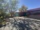 Exterior view of the home showcasing its charming architectural design and desert surroundings at 6528 N Hillside Dr, Paradise Valley, AZ 85253