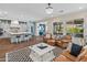 Open-concept living room with a direct view of the modern kitchen at 70 E Kennedia Dr, Queen Creek, AZ 85140