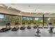 Well-equipped fitness center with treadmills, ellipticals, and scenic outdoor views from large windows at 7705 E Doubletree Ranch Rd # 29, Scottsdale, AZ 85258