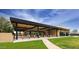 Exterior view of the patio, with chairs, tables, landscaping, and a covered outdoor seating area at 7705 E Doubletree Ranch Rd # 29, Scottsdale, AZ 85258