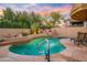 Beautiful pool area featuring mature trees, a baja step, and a desert landscape at 7705 E Doubletree Ranch Rd # 29, Scottsdale, AZ 85258