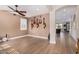 Open-concept living room featuring tile floors, recessed lighting, and a ceiling fan at 7910 W Spur Dr, Peoria, AZ 85383