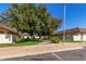 Scenic exterior view of a well-maintained property with mature trees and green spaces at 8101 N 107Th Ave # 23, Peoria, AZ 85345