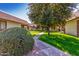 Pleasant exterior featuring lush greenery, mature trees, and landscaped grounds at 8101 N 107Th Ave # 23, Peoria, AZ 85345