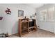 Living room featuring carpet, a ceiling fan, and a decorative media center at 8101 N 107Th Ave # 23, Peoria, AZ 85345