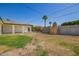 Expansive backyard with lush lawn and a privacy fence at 829 E Desert Park Ln, Phoenix, AZ 85020