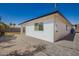 Rear exterior view of a charming home featuring a paved drive at 829 E Desert Park Ln, Phoenix, AZ 85020