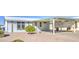 Single-story home with a carport, manicured landscaping, and a well-maintained exterior at 8500 E Southern Ave # 463, Mesa, AZ 85209