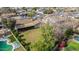 Backyard view of a covered patio, green grass, and a fenced-in yard at 947 N Saffron --, Mesa, AZ 85205