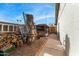 Side yard displaying various ladders, a storage shed with supplies, and a brick-lined walkway at 947 N Saffron --, Mesa, AZ 85205