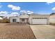 Charming single-story home with a well-maintained front yard and attached two-car garage at 949 E Piute Ave, Phoenix, AZ 85024