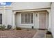 Inviting front entrance with security door and well-maintained landscaping adding curb appeal at 949 E Piute Ave, Phoenix, AZ 85024