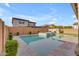 Sparkling backyard pool and raised spa, set against a backdrop of lush landscaping and privacy walls at 9730 E Resistance Ave, Mesa, AZ 85212