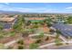 Aerial view of a community park including playground, sports fields, and green space at 9730 E Resistance Ave, Mesa, AZ 85212