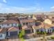 Beautiful two-story home in a residential neighborhood with tile roof and manicured front yard at 9730 E Resistance Ave, Mesa, AZ 85212