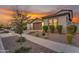 Inviting single-Gathering home featuring a two-car garage, low-maintenance landscaping, and a pleasant street view at 9730 E Resistance Ave, Mesa, AZ 85212