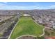 Aerial shot of a park and parking lot surrounded by community homes at 9730 E Resistance Ave, Mesa, AZ 85212