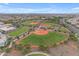 Aerial view of the park baseball fields surrounded by homes and roads at 9730 E Resistance Ave, Mesa, AZ 85212