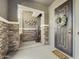 Inviting home entryway with decorative details and a welcoming front door at 10049 E Topaz Ave, Mesa, AZ 85212