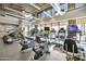Enjoy this modern gym with large windows, treadmills, elliptical machines, and free weights at 10049 E Topaz Ave, Mesa, AZ 85212