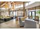 Inviting lounge area featuring comfortable seating, stylish lighting, and expansive windows, creating a relaxing space at 10049 E Topaz Ave, Mesa, AZ 85212