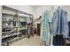 Large walk-in closet with ample shelving and hanging space for optimal organization at 10049 E Topaz Ave, Mesa, AZ 85212