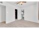 Bedroom featuring neutral carpet and access to the kitchen and closet at 1007 W 5Th St, Mesa, AZ 85201