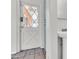 Inviting entryway with a charming white door and a partial view of the bathroom sink at 1007 W 5Th St, Mesa, AZ 85201