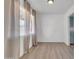 Bright living room featuring light wood floors, neutral walls, and natural light at 1007 W 5Th St, Mesa, AZ 85201