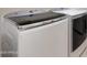 A white front load washer and dryer at 10145 E Cintron Dr, Mesa, AZ 85212