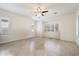 Light-filled bedroom with multiple windows and a ceiling fan at 10145 E Cintron Dr, Mesa, AZ 85212