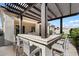 Outdoor kitchen with bar seating and a pergola, perfect for entertaining at 10145 E Cintron Dr, Mesa, AZ 85212