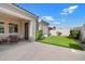 Cozy patio with a table set and artificial turf, ideal for relaxation at 10145 E Cintron Dr, Mesa, AZ 85212