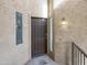 Close up of front door with address number and textured walls at 10410 N Cave Creek Rd # 2119, Phoenix, AZ 85020