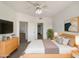 Comfortable bedroom with ceiling fan, TV and ample closet space at 10410 N Cave Creek Rd # 2119, Phoenix, AZ 85020