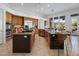 Spacious kitchen with stainless steel appliances, granite countertops, and tile flooring at 10886 E Ludlow Dr, Scottsdale, AZ 85255