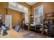 Cozy office with built in shelving and storage for a comfortable work environment at 10886 E Ludlow Dr, Scottsdale, AZ 85255