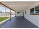 Large covered back patio overlooking a yard with low-maintenance landscaping at 12207 N Escobar Way, Phoenix, AZ 85022