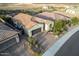 Expansive aerial view of a single-Gathering home with a desert landscape and a private driveway at 12924 W Caraveo Pl, Peoria, AZ 85383