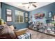 This blue bedroom features Star Wars décor and recessed lights for optimal lighting at 12924 W Caraveo Pl, Peoria, AZ 85383
