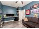 Charming office space features a wall desk and a cozy sitting area at 12924 W Caraveo Pl, Peoria, AZ 85383