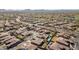 High aerial view of neighborhood featuring many homes in a planned community at 1320 W Whitman Dr, Anthem, AZ 85086