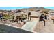 Beautiful overhead shot of the home, highlighting the desert landscaping and tiled roof at 1320 W Whitman Dr, Anthem, AZ 85086